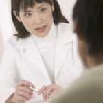 Female Doctor Talking with Patient